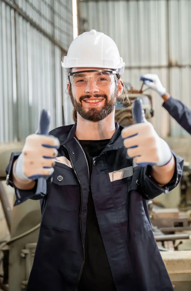 Technician with 2 thumbs up for paint drying equipment that requires low maintenance | Sun-Spot