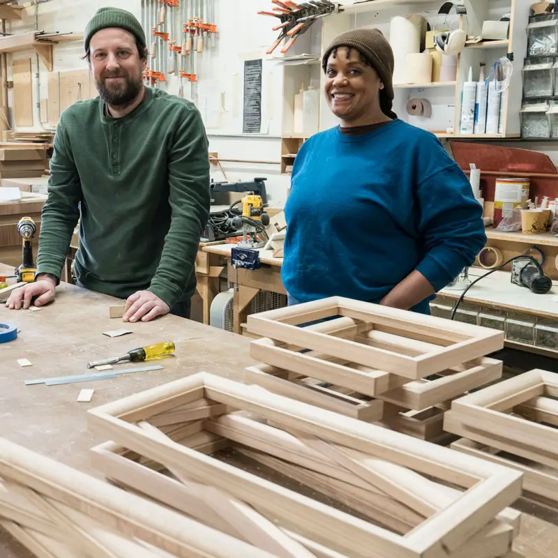 Happy entrepreneurs that us paint drying equipment for their woodworking finishing | Sun-Spot